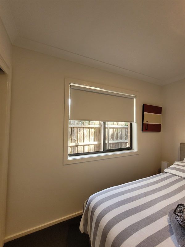 Blockout roller blind on a bedroom window
