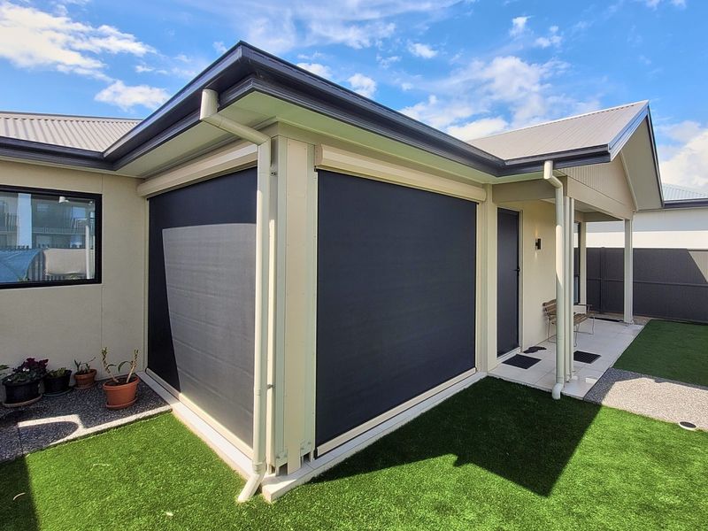 Zip track outdoor blinds enclosing a corner alfresco in Clyde North